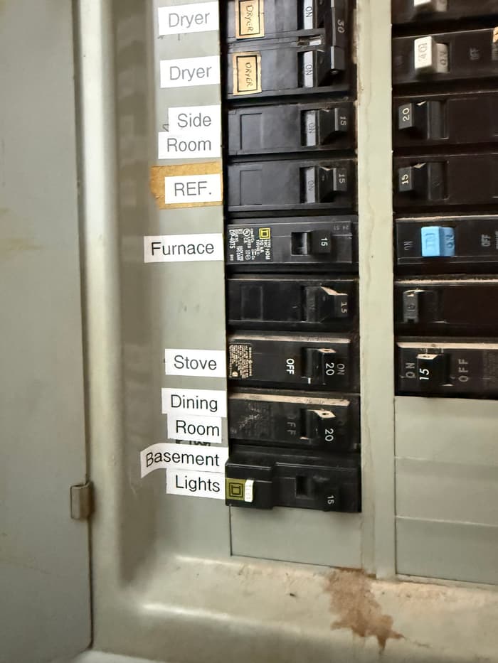 An older panel relabeled so every breaker in the house is easy to identify.